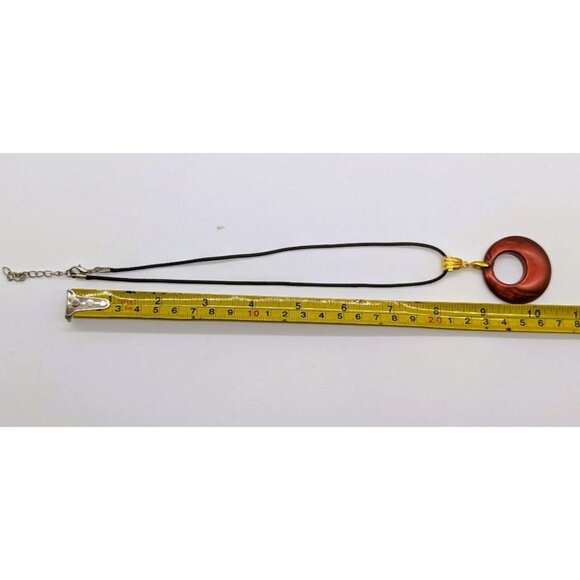 Red Circular Pendant Necklace With Gold Bail On Black Cord - Picture 5 of 5